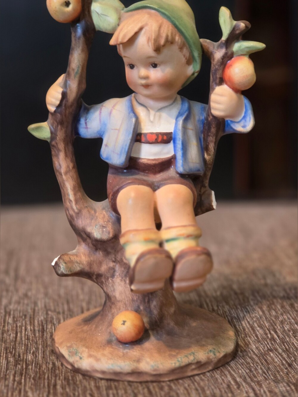 Hand-Painted Ceramic Boy on Tree Figurine - Green/Blue/Brown